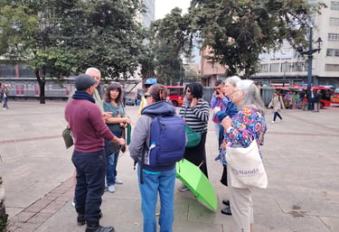 Happy tourist wearing custom emerald ring made in Bogota