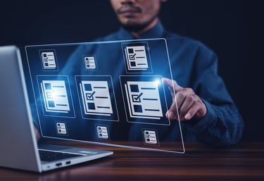 Image of a man looking at a laptop and virtual screen image