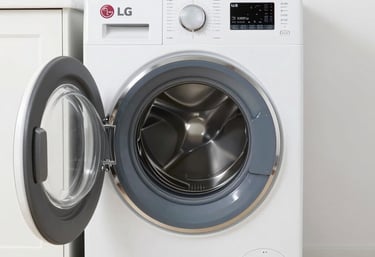 Technician repairing a modern 100-inch LG television in a cozy living room.