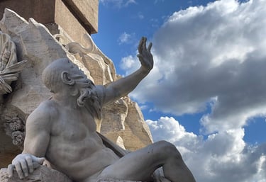 The Nile River God statue at Bernini's Fountain of the Four Rivers in Piazza Navona, Rome.
