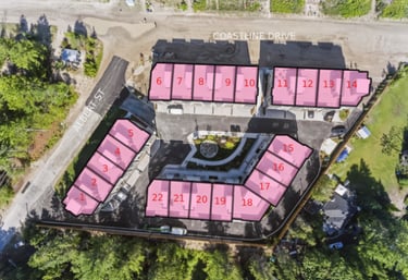 Aerial view of a townhome development project with 22 numbered units highlighted in pink.