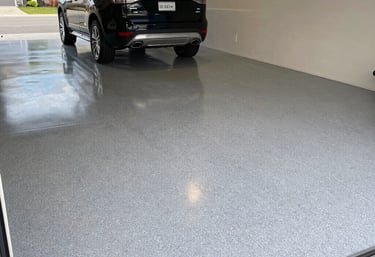 Durable epoxy garage floor coating supporting vehicle traffic in Celina Texas residential garage