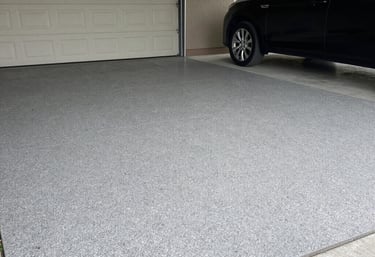 Durable concrete floor coating designed to handle vehicle traffic in residential garage