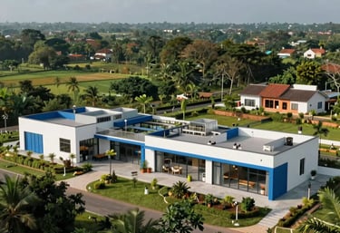 A wide photography shot of a modern, eco-friendly community center in a lush South Asian rural landscape, showcasing clean architecture and blue accents.