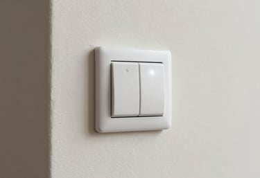 A smart lighting wall switch with a glowing LED indicator inside a modern South American / Brazilian home. The wall is painted a subtle Off-White. Professional composition focusing on technology and ease of use.