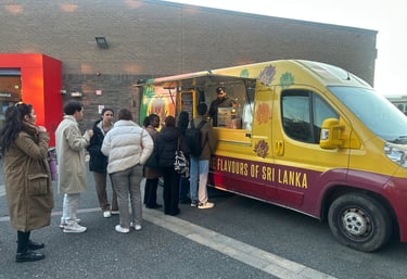 Sri-Licious food van with a queue