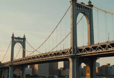 Cinematic wide shot of a modern city bridge in North American / US during the golden hour. Warm light, authentic atmosphere, high-end engineering.