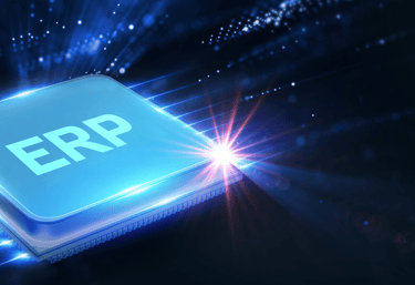 A glowing blue computer chip featuring the ERP acronym to represent enterprise resource planning software technology.