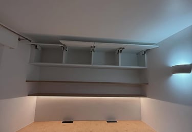 a desk with a desk with a shelf with three drawers