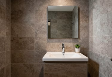 Photography of a luxury Australian bathroom renovation with brown earth-toned tiles and light grey walls, feeling sophisticated and serene.