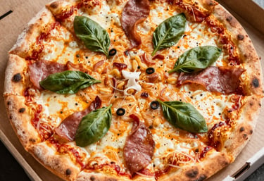Close-up of a freshly baked Margherita pizza with melted cheese and basil leaves on a wooden table.