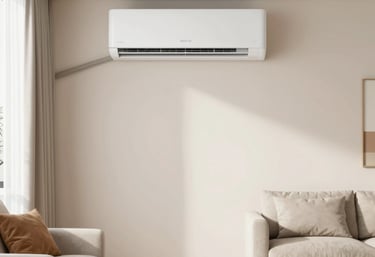Technician installing a wall-mounted air conditioner in a cozy living room.