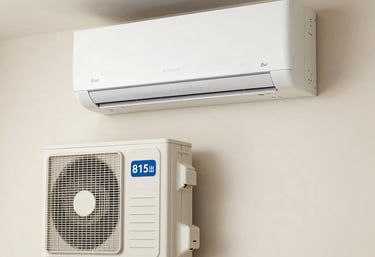 Technician installing a modern air conditioning unit in a bright living room.