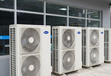 Close-up of a professional adjusting air conditioning controls with precision.