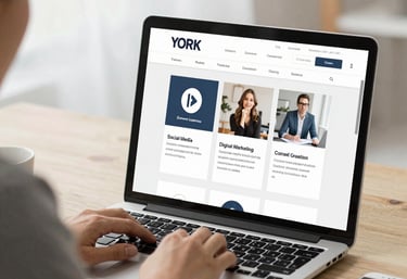 Modern workspace featuring a designer sketching user interface concepts on a tablet.