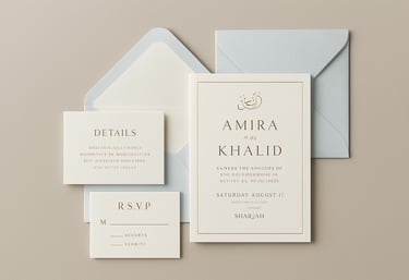 An assortment of bespoke wedding stationery in Sharjah, showcasing heavy cardstock, elegant foil textures, and #F0F4F7 envelopes.