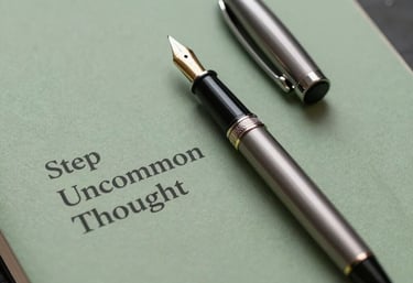 A close-up of a high-end fountain pen sitting on a sage green notebook, representing the 'Uncommon Thought' step of the creative process.