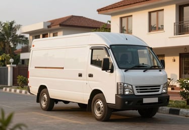 A wide shot of a clean, well-maintained commercial vehicle parked in a modern South Asian / Indian residential area, golden hour lighting.