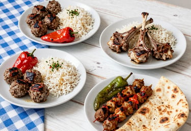 A rustic wooden table by the river with colorful plates of traditional Turkish dishes from Nehirbahçe restaurant.