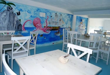 Pintura local que representa a autenticidade do hotel Big Game Maio em Maio