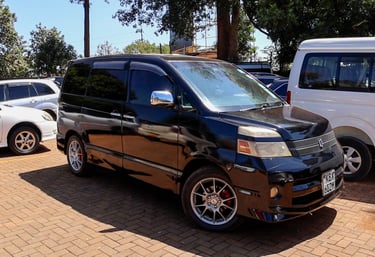Black Toyota Voxy for younger smaller children for private school transport by Vanna Ventures