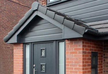 grey door on front of house in worcester fitted by General Builds