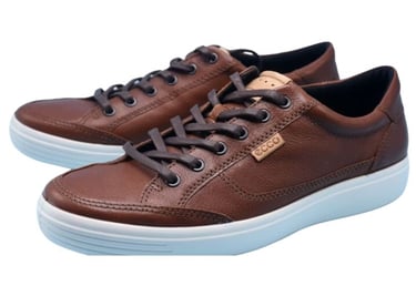 a brown leather sneaker with a white sole and blue soles