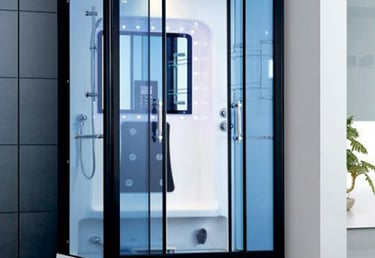 a modern shower room with a glass shower
