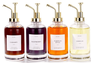 4 coffee syrup bottles with varying syrup flavors