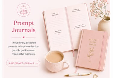 Pink guided prompt journal for gratitude and reflection with a coffee cup and flowers.