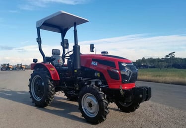 a red 40HP/4wd tractor with a canopy over it