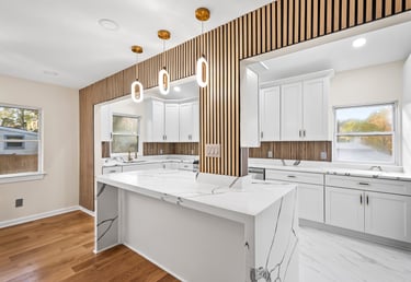 Modern renovated kitchen in Springfield, VA featuring updated cabinetry, new countertops, and bright