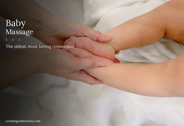 A parent gently performing a baby massage on an infant's feet and legs for bonding and relaxation.