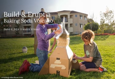 Children building a large cardboard baking soda volcano outdoors for a fun science project.