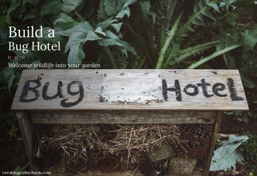 A DIY wooden bug hotel with straw and pinecones to attract beneficial insects to a garden.