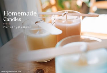 Homemade candles in glass jars setting with wooden wick holders on a table.