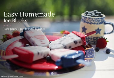 Easy homemade fruit ice blocks with fresh blueberries and strawberries on a colorful plate.