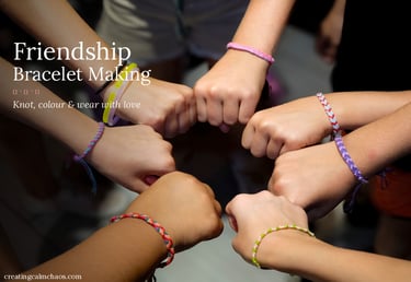 A group of children join hands wearing colorful handmade friendship bracelets in a circle.