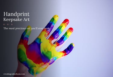 A child's hand covered in colorful rainbow paint for a handprint keepsake art project.