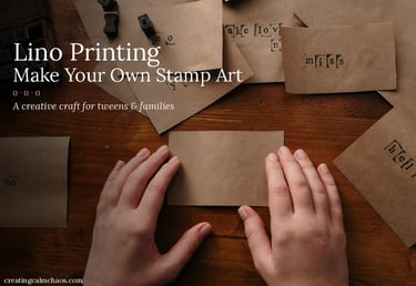 Hands working on DIY lino printing and stamp art on brown craft paper cards over a wooden desk.