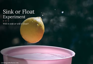A whole yellow lemon falling into a pink bowl of water for a sink or float science experiment.