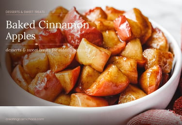 A white bowl filled with warm, glazed baked cinnamon apples, a soft dessert for seniors.
