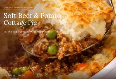 Soft beef and potato cottage pie with peas and carrots, an easy batch cook meal for elderly parents.