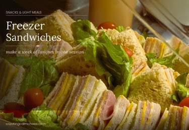 A variety of make-ahead freezer sandwiches with ham, cheese, and lettuce for easy meal prep lunches.