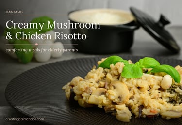 Creamy mushroom and chicken risotto served on a black plate with fresh basil garnish.