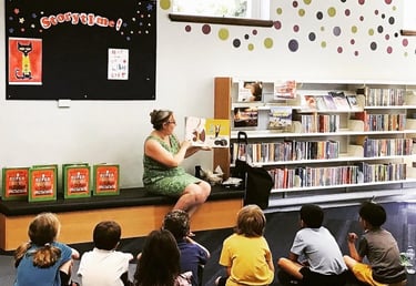 Polly Owen at Watford Central Library reading Darwin's Super-Pooping Worm Spectacular. Author events