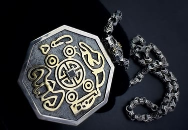 a silver and gold necklace with a MONEY sign