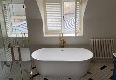 Luxury bathroom refurbishment with fitted bathtub and vanity unit in Worcestershire