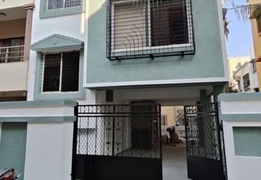 Exterior house painting showcasing complete home transformation with professional paint application