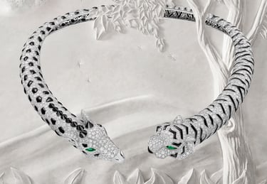 Signature Cartier Panthère bracelet with diamond and onyx design.